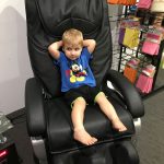 Young Boy in a Massage Chair — Gift Shop in Maryborough. QLD